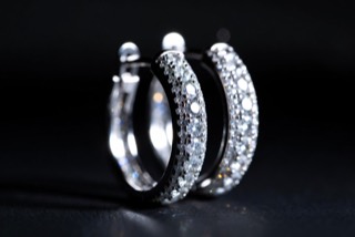 A pair of set hoop earrings.