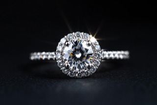 A ring photographed against a dark ground.