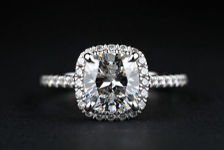 A ring photographed against a dark ground.